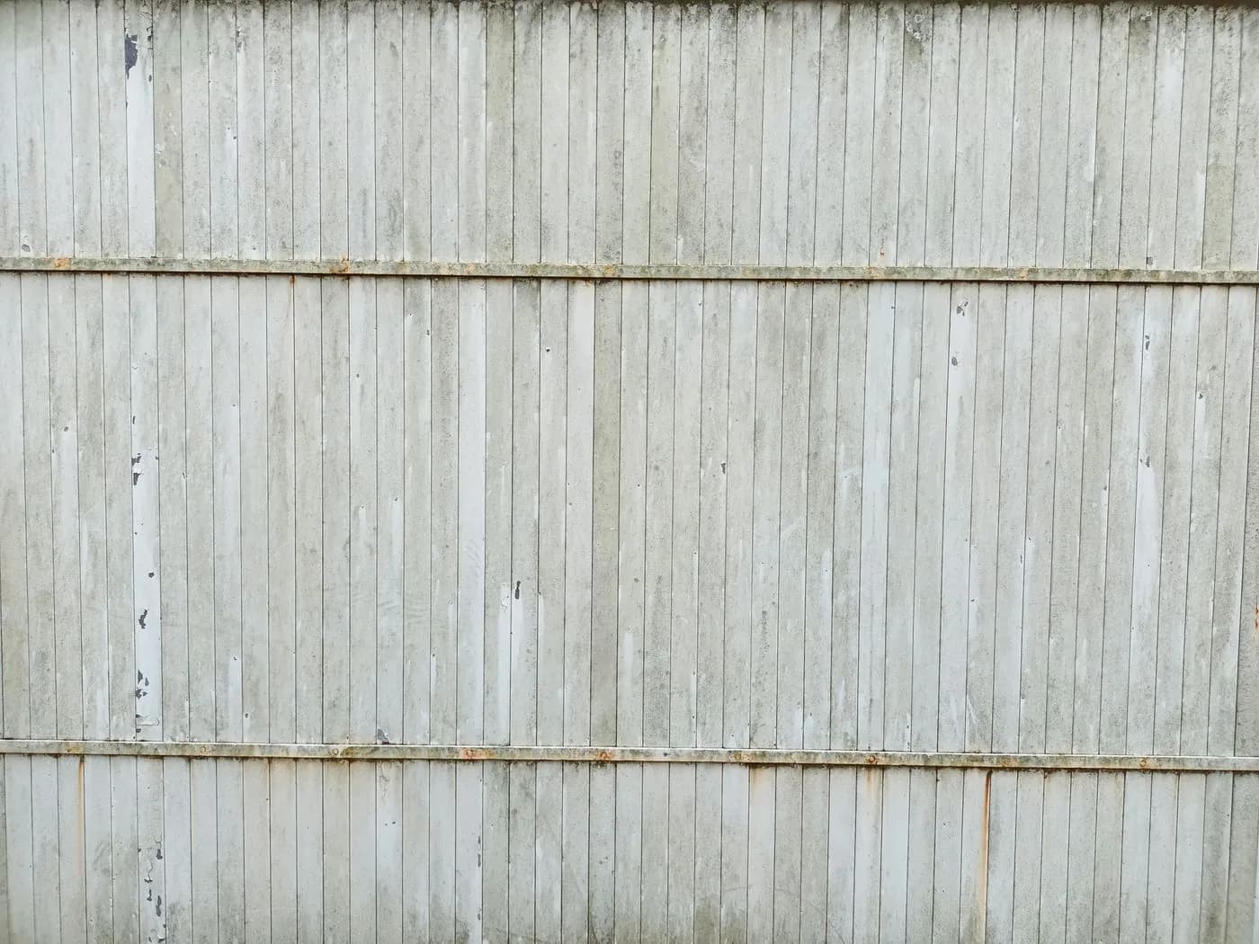 Close view of vertical wood fence boards